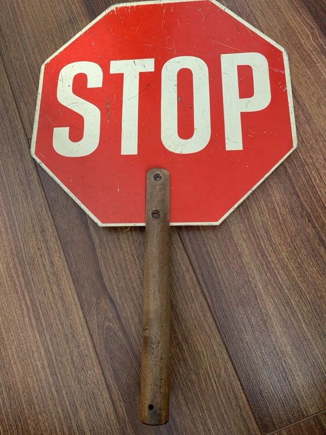 Old crossing guard stop sign