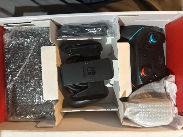 Nintendo Switch V2 with Games & Accessories - photo 4