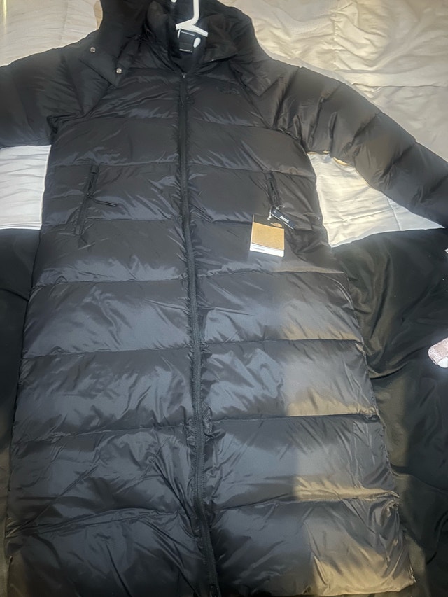The North Face women’s long down parka Jacket. Priced to sell!