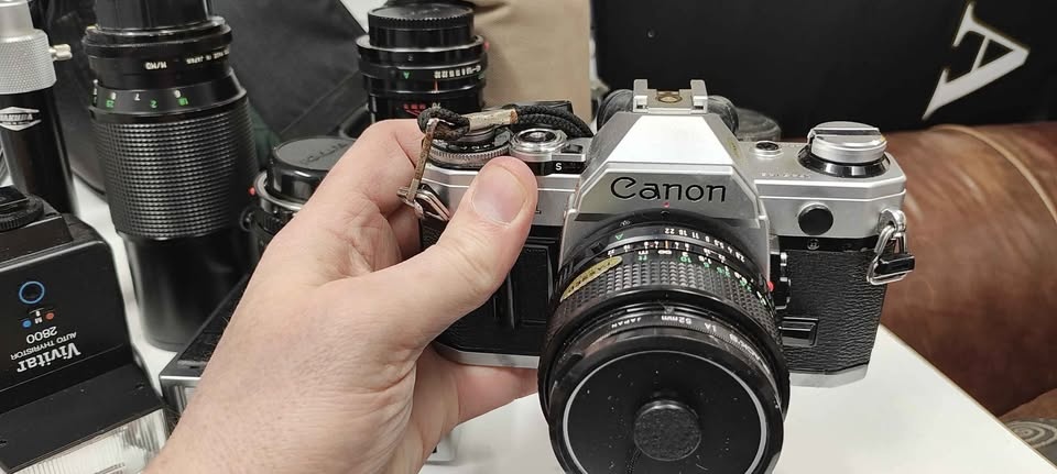 Canon AE-1 SLR Camera and Accessories - photo 2