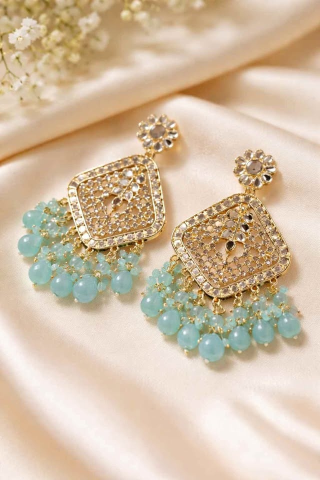 Sparkly gold earrings with aqua beads, statement style