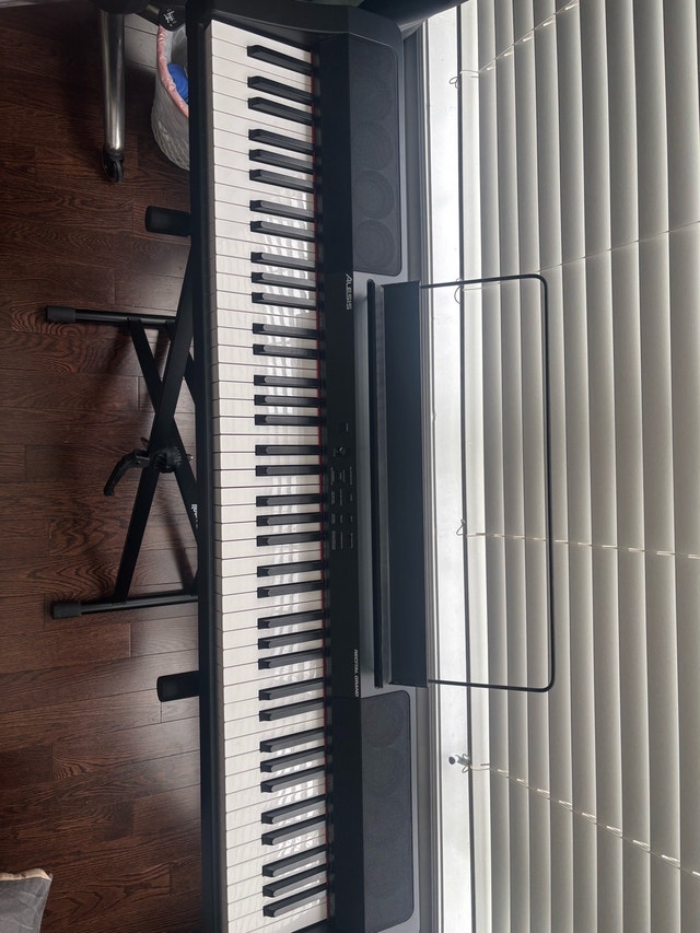 600 dollars worth Alesis Recital Piano and FREE stand