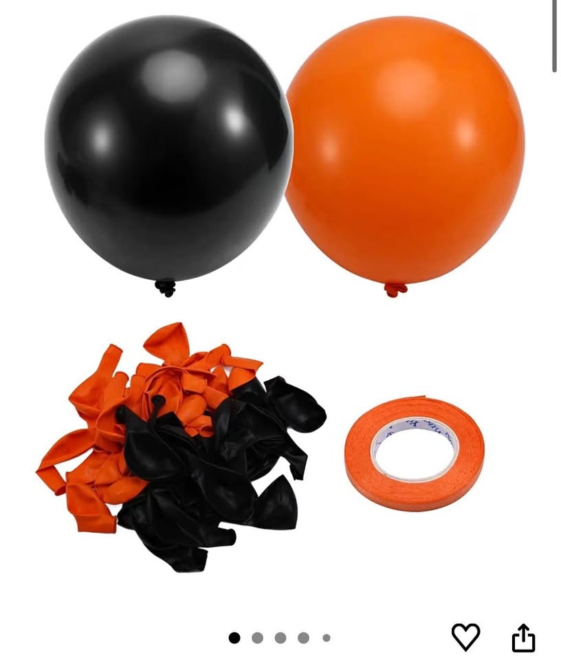 Sand, orange and black balloons