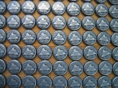 100 LOT COORS LIGHT BORN IN THE ROCKIES 1978 BEER BOTTLE CAPS