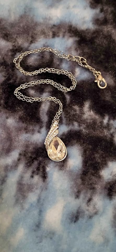 Silver-tone necklace with sparkly teardrop pendant