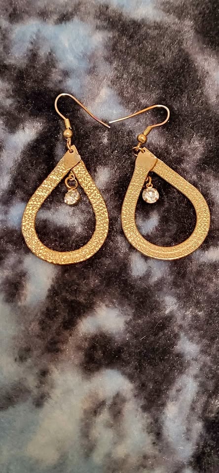 Gold teardrop dangle earrings with rhinestone