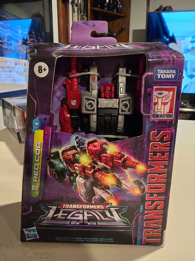 Transformers Legacy Red Cog Deluxe Class Figure