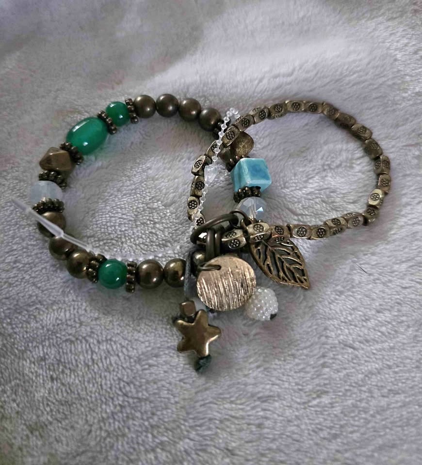 Vintage two bracelet attached by charms