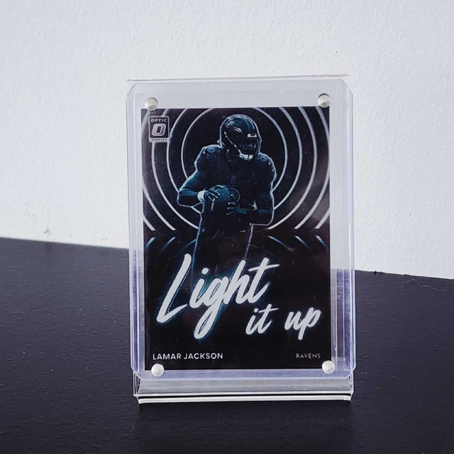 Lamar Jackson "Light It Up" + Green Prizm Holo