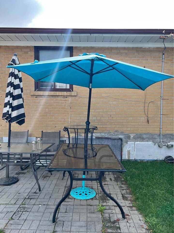 Patio glass table ,with umbrella free chairs