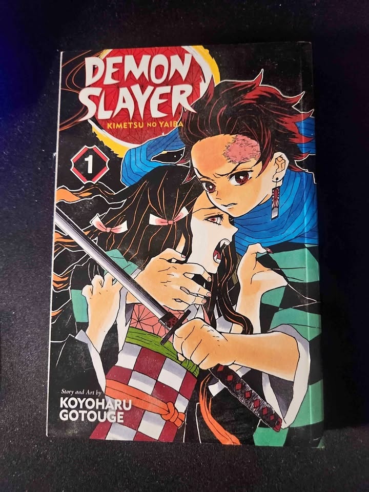 Demon Slayer Manga Volumes 1, 2, & 4