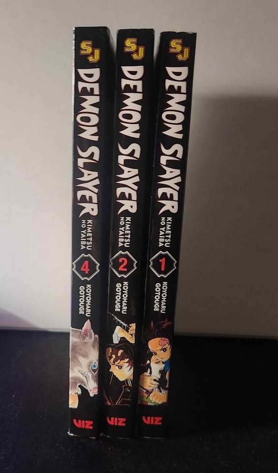 Demon Slayer Manga Volumes 1, 2, & 4 - photo 4