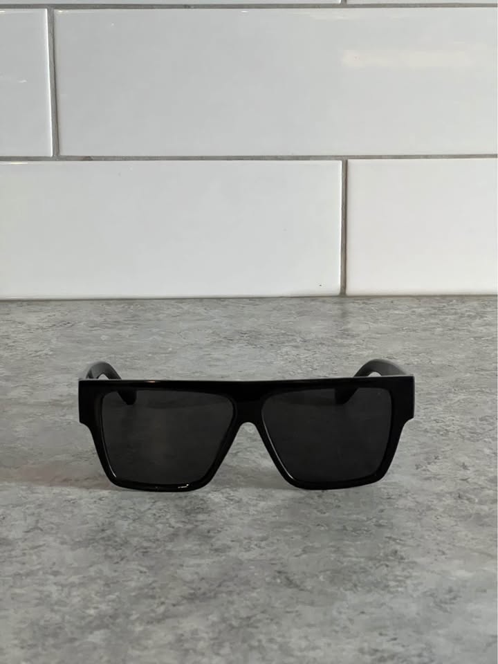 Thick black sunglasses