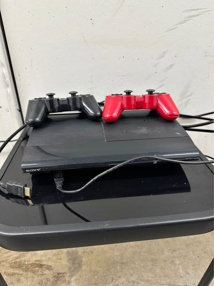Sony PlayStation 3 Super Slim – Console with 2 Controllers