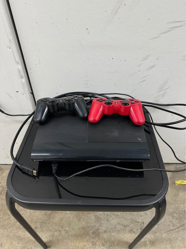 Sony PlayStation 3 Super Slim – Console with 2 Controllers - photo 2
