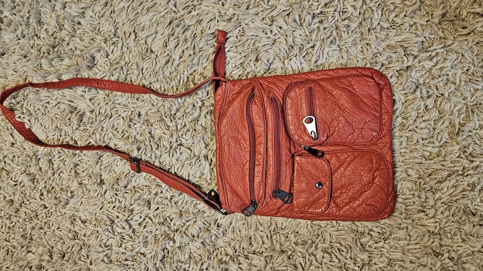 Red crossbody bag with lots of pockets