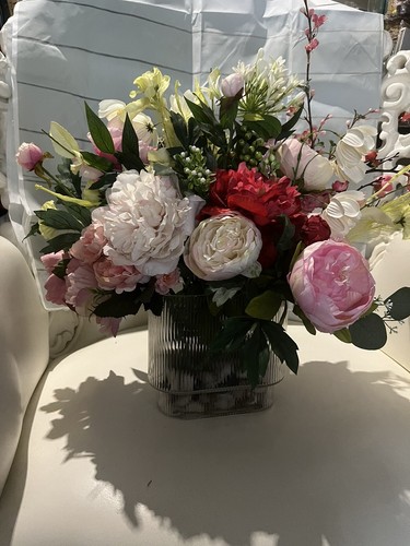 Custom made Lush Luxurious flower arrangements In a Mid century