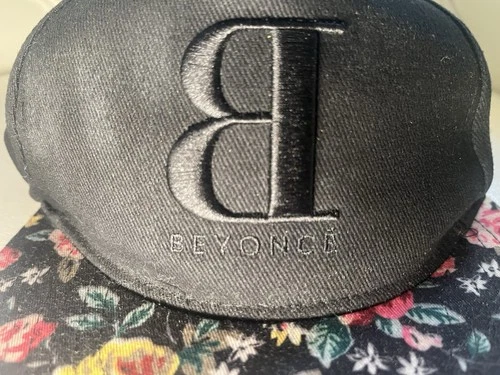 Black Unisex Snapback Cap with "B" Beyonce Logo and Floral Brim