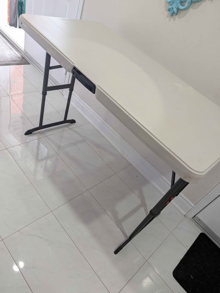 4-Foot Fold-In-Half Adjustable Table - photo 2