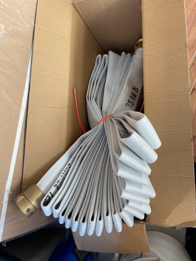 75 feet new fire hoses 2 of them.