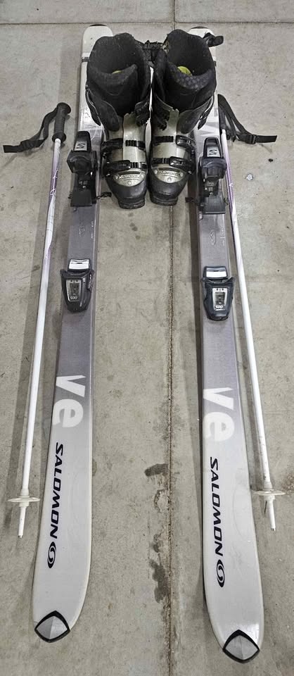 Womens skis, poles, bindings and boots.