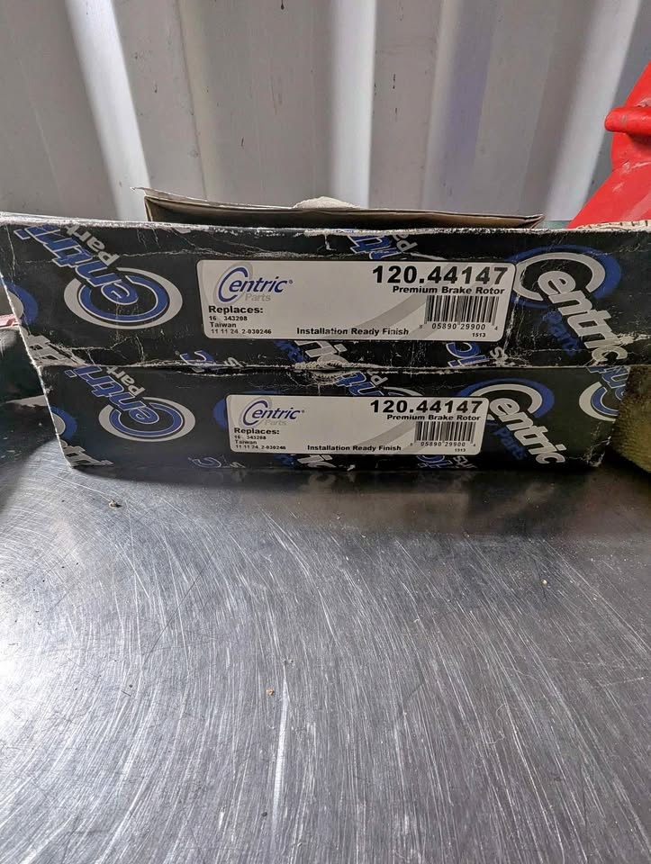Centric Rotors and Posi Quiet Brake Pad Set - New