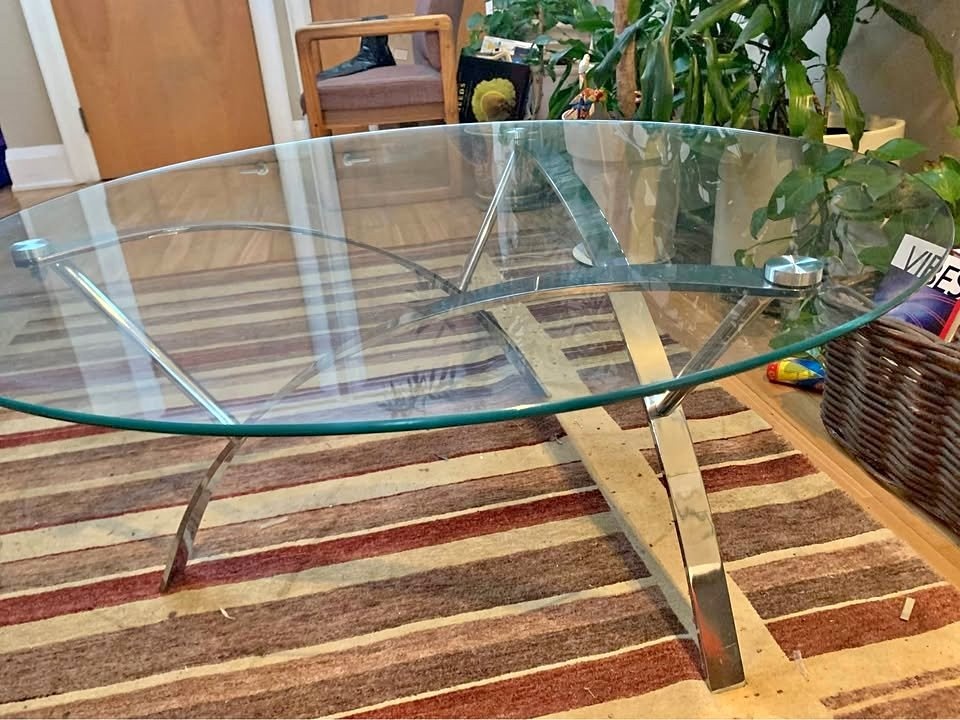 Elegant glass and stainless steel coffee table