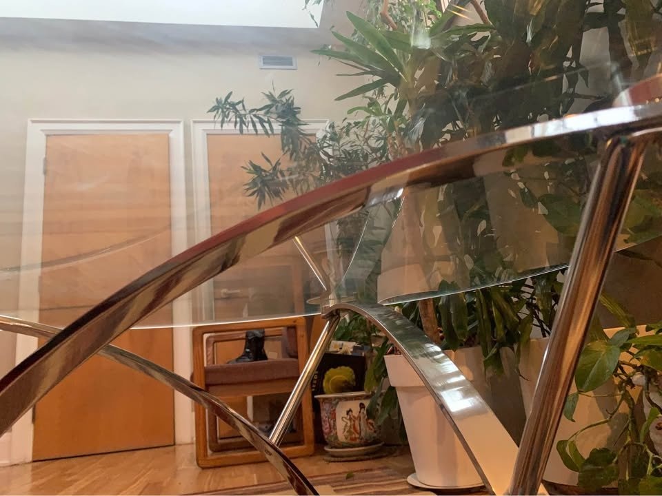 Elegant glass and stainless steel coffee table - photo 2