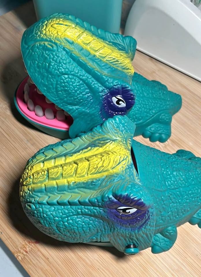 Dinosaur finger biting toy
