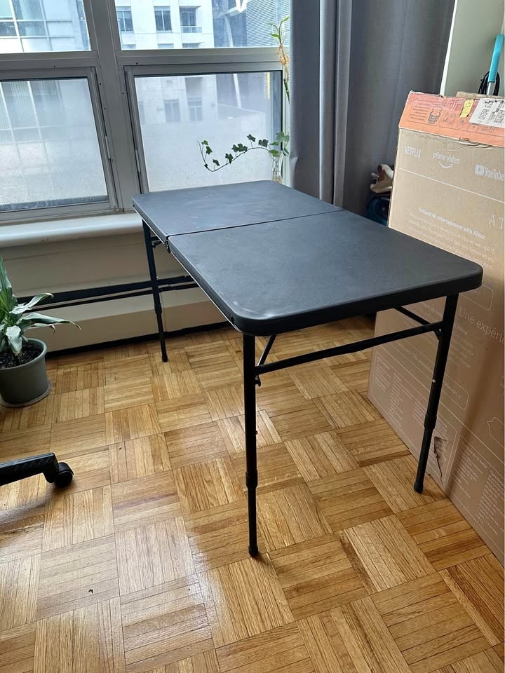 Black folding table adjustable height
