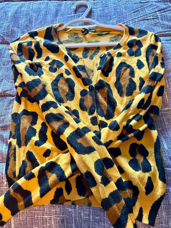Woman’s yellow leopard shirt