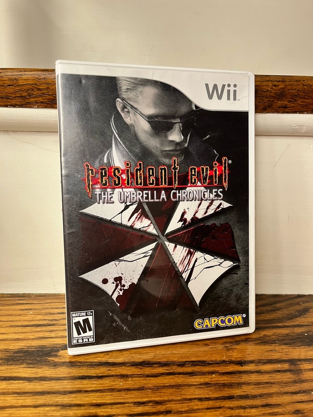 Resident Evil Umbrella Chronicles Complete w/ Manual (Wii)