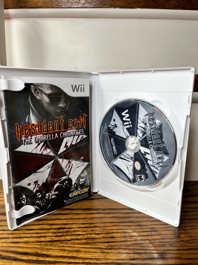 Resident Evil Umbrella Chronicles Complete w/ Manual (Wii) - photo 3