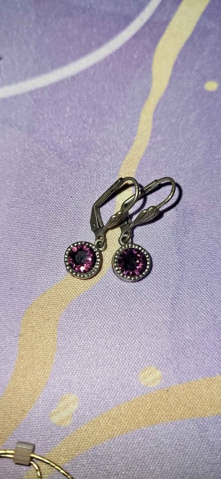 Silver tone purple stone earrings