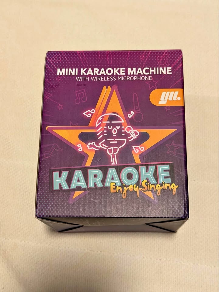 yu. Mini Karaoke Machine with Wireless Mic