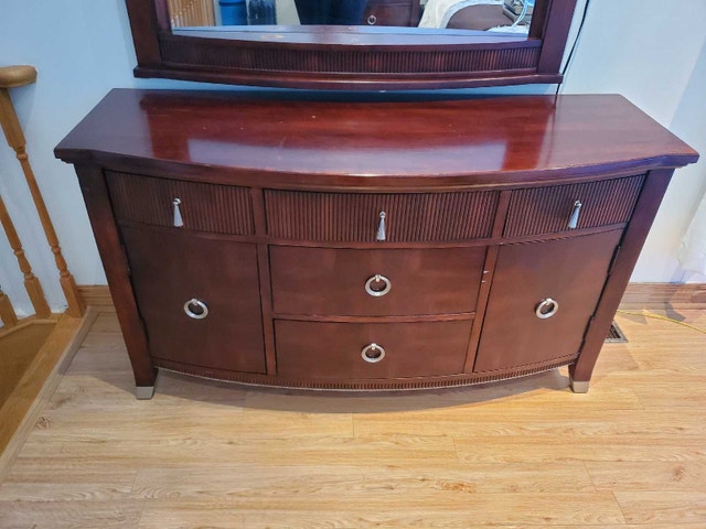 Dark brown dresser with lighted mirror