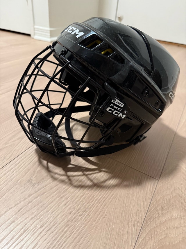 CCM Hockey Helmet with Cage (size XS)