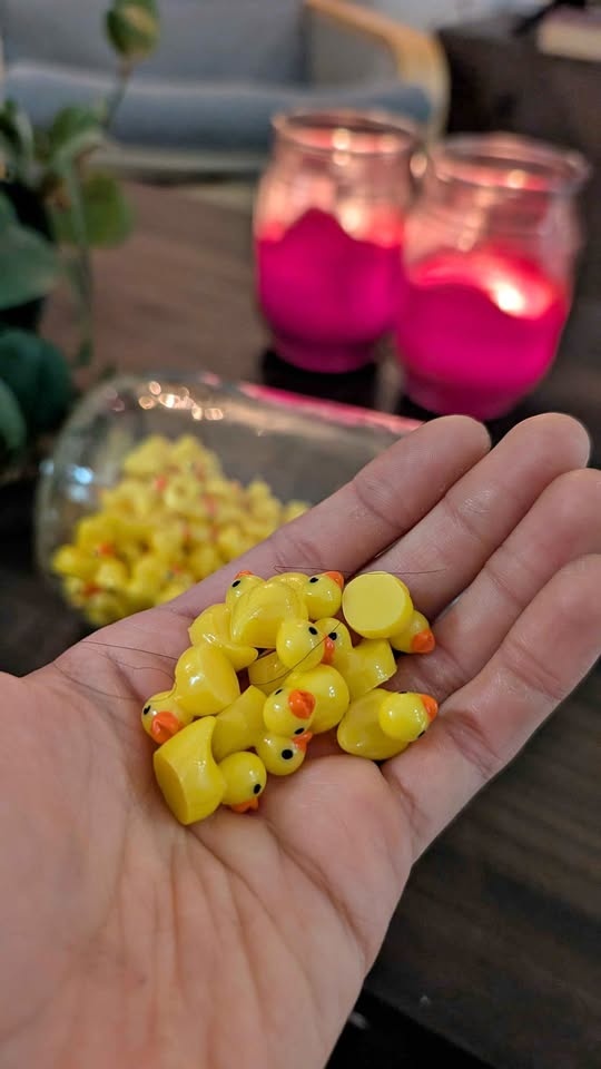 A jar of 100 yellow ducks