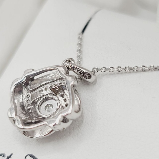 Sterling Silver 1/10 Carat T.W. Diamond Knot Pendant Necklace - photo 3