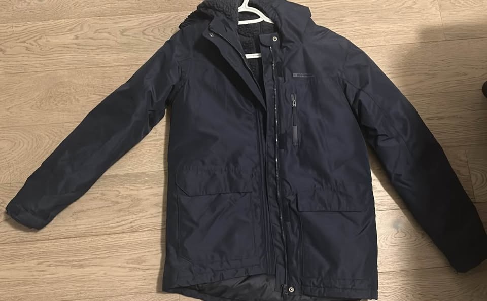 Mountain Warehouse Waterproof Jacket, warm enough for skiing.