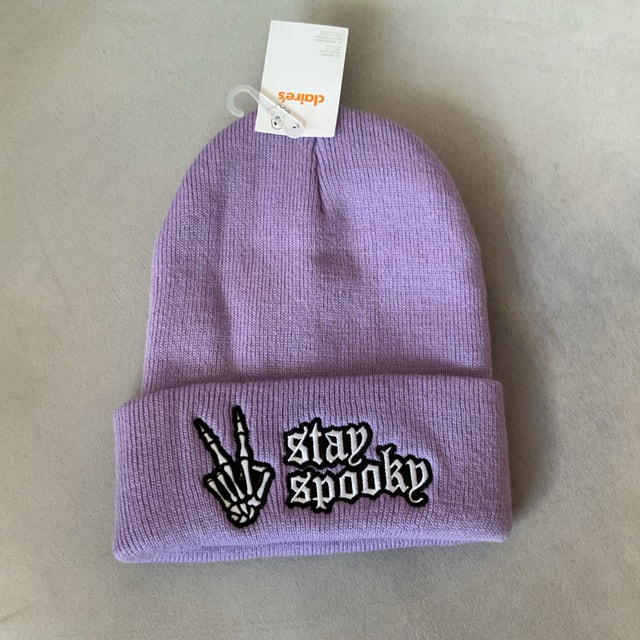 Claire’s “Stay Spooky” Lavender Beanie Hat — $10 each