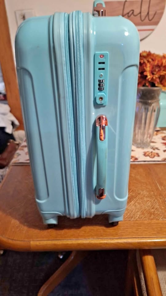 Suitcase for sale. Beautiful color. Pickup and cash only.