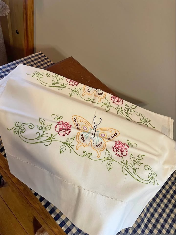 Embroidered butterfly and floral pillowcases