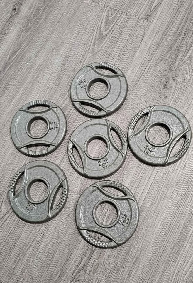 Amazon Basics 2-Inch Olympic Cast Iron Grip Weight Plates - photo 2