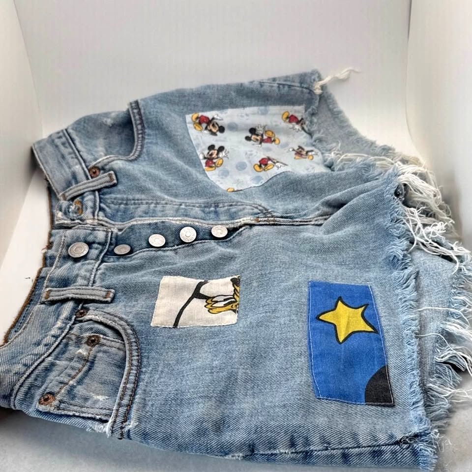 Vintage Levi's Blue Jean Shorts with Disney Patches - size 2