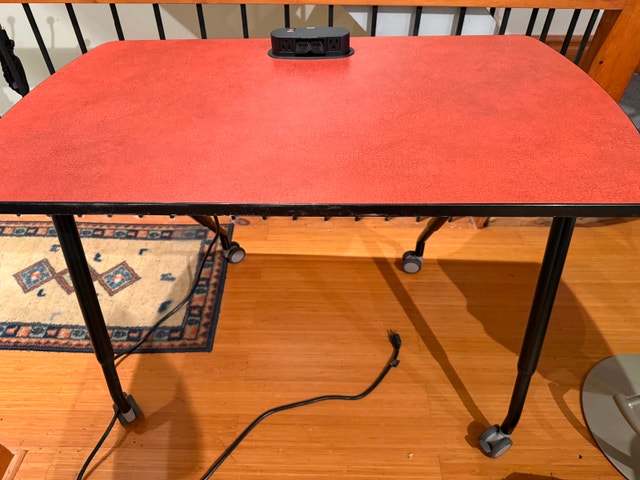 Roll Away Ironing Table