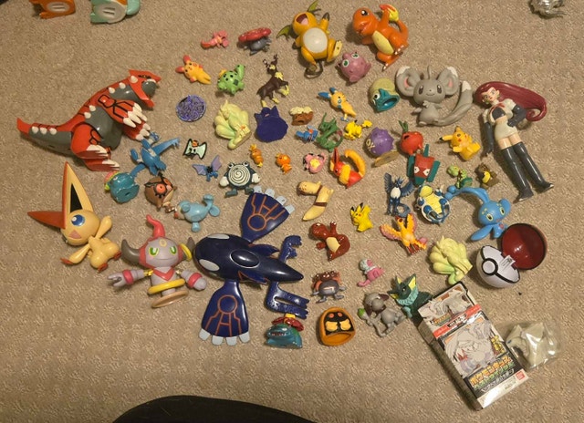 Pokemon Figures and Trading Card Boxes