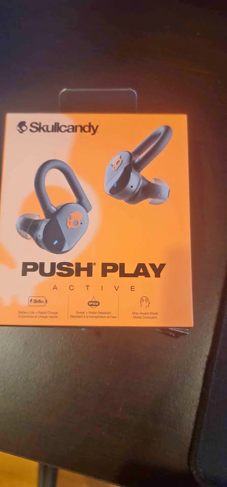 SKULLCANDY bluetooth headphones.