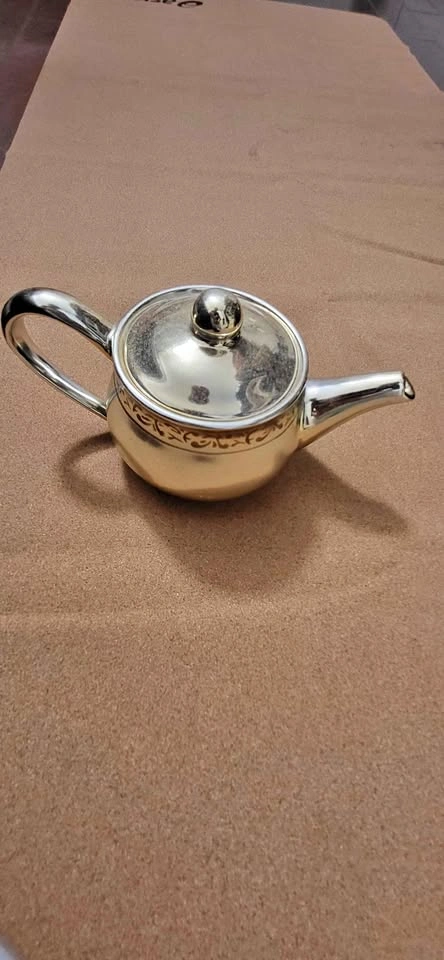 Golden teapot