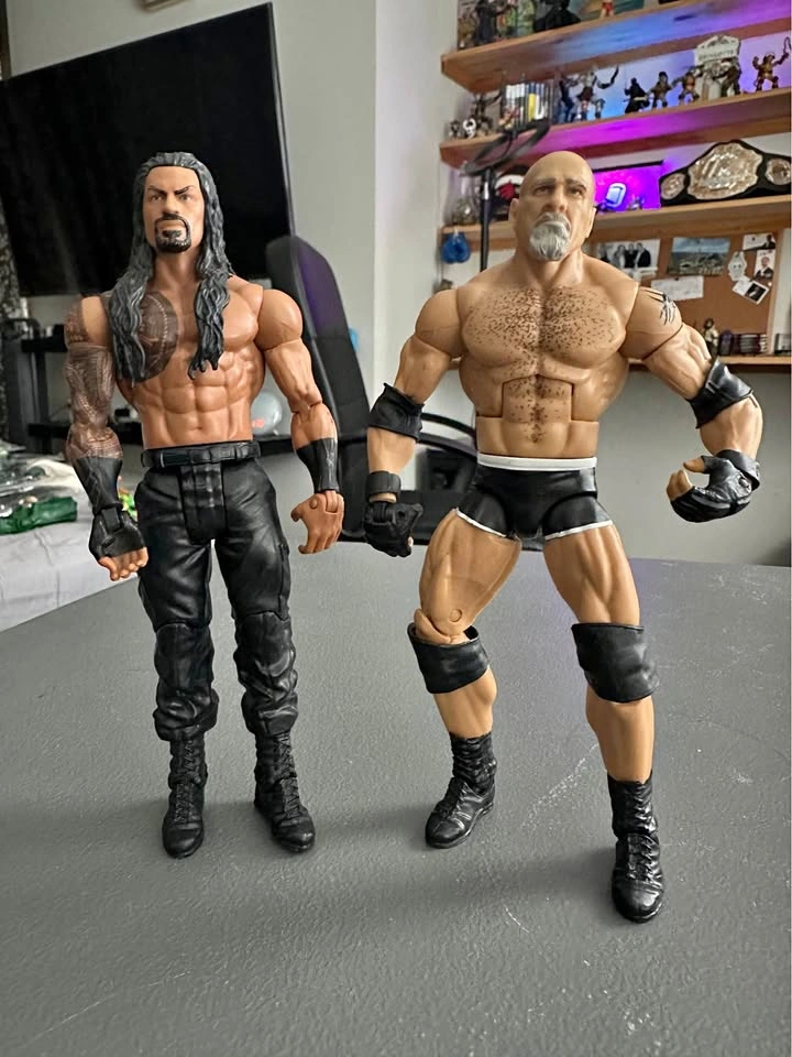 Bill Goldberg and Roman Reigns
